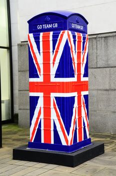 Telephone box decorated as union jack flag