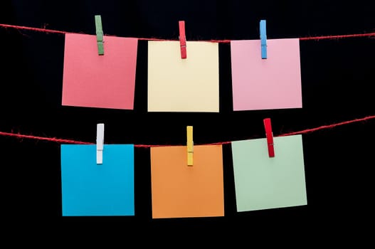 Color paper notes hanging on a rope