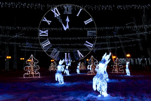 The photograph shows the tree with clock