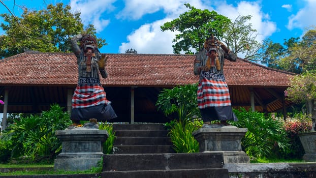 Statues of the gods at the entrance to a temple in Bali, Indonesia