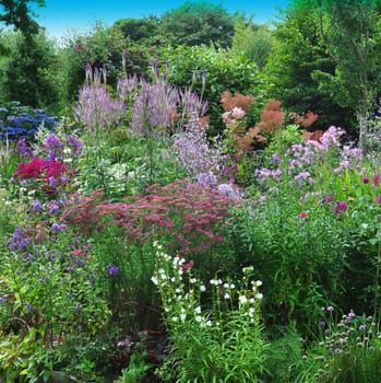 Garden scene resonant of such a sight all over the world where people sculpt,design and tend thier little piece of heaven