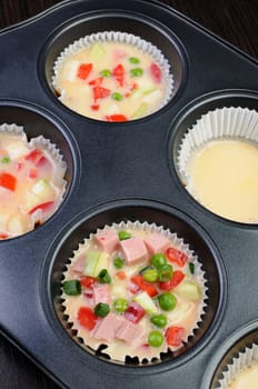 Prepared for roasting Portion vegetable casserole with ham