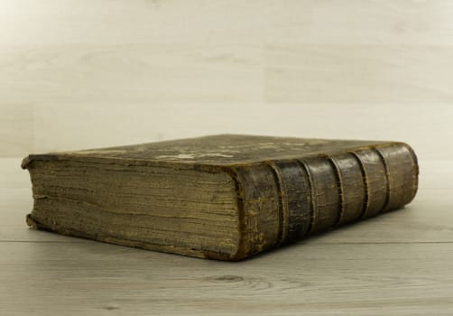 old book on wooden background