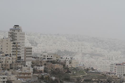 WEST BANK, Bethlehem: A general view of the Palestinian city of Bethlehem, as a sandstorm hits Israel and West Bank, causing air pollution, on January 19, 2016. A low-pressure system over the Mediterranean has driven the dust northeast from Egypt and the Sinai Peninsula.