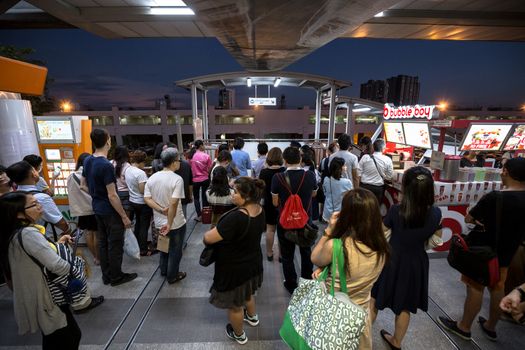 Bangkok, Thailand - January 18, 2016 : People waiting to go out of the BTS Mo Chit station because of some accident outside. Daily passengers of BTS skytrain is around 700,000.