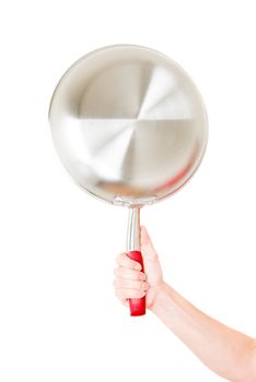 Steel frying pan hold by hand isolated on white background