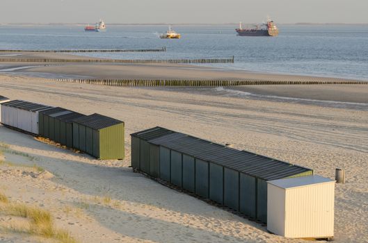 Beach huts on a beach in Zeeland in the South of the Netherlands
