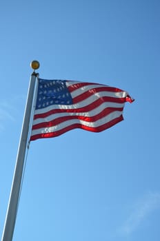 American flag flying in the wind.