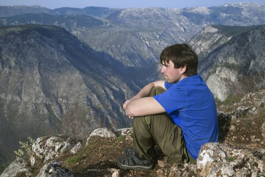 Canyon of river Tara, Montenegro and a man looking from above