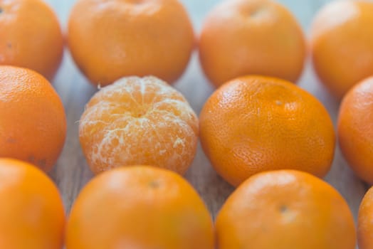 Group of the tangerines on the wood background