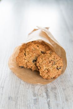 Oatmeal cookies in the craft paper bag
