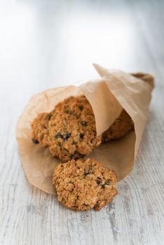 Oatmeal cookies in the craft paper bag