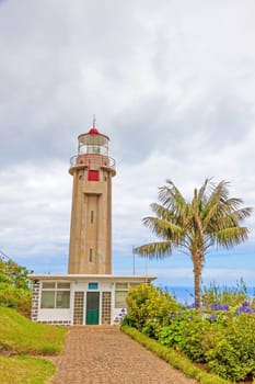 Sao Jorge, Madeira - June 7, 2013: Lighthouse Ponta de Sao Jorge - a famous tourist sight at the north coast of Madeira.