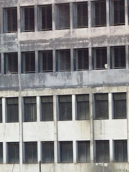 An abstract view of windows on a new building being constructed.