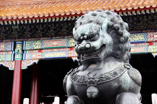 Lion made from copper taken infront of the Forbidden City in Beijing, China (it's a bit wet from the rain)