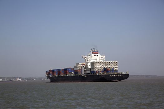 cargo ship sailing in the ocean