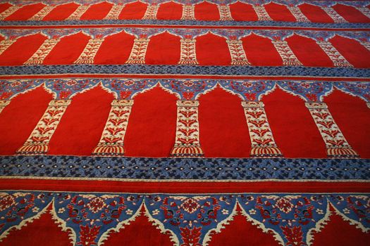 Red carpet with arabic motive from a mosque (Blue Mosque, Istanbul)