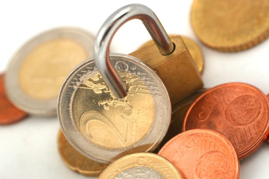 Euro coins protected with padlock