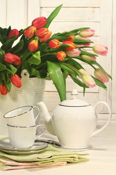 Tea set with tulip flowers for Easter