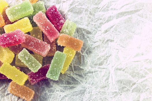 Candied fruit jelly sweets on paper - vintage look