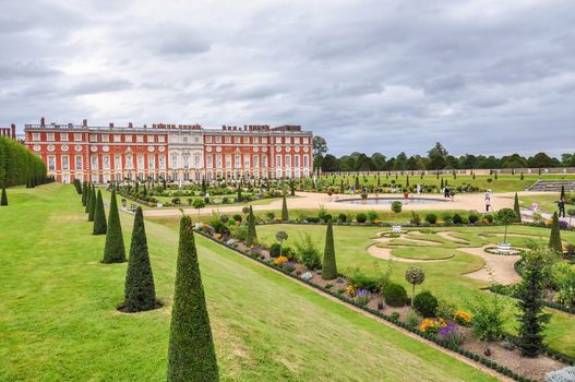 London, United Kingdom - AUGUST 26, 2009: View of the Historic Royal Palace of Hampton Court. It was originally built for Cardinal Thomas Wolsey, a favorite of King Henry VIII.