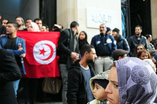 TUNISIA, Tunis: Tunisians shout slogans outside the headquarters of Tunis Governorate, on Habib Bourguiba, during an anti-government demonstration on January 20, 2016  in solidarity with demonstrators demanding jobs in the central Tunisian city of Kasserine Authorities imposed a curfew on the impoverished city of Kasserine, where tensions have been high since January 16, 2016 when a young unemployed man suffered a fatal electric shock during a protest