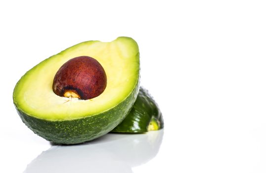 ripe avocado in a cut on a white background