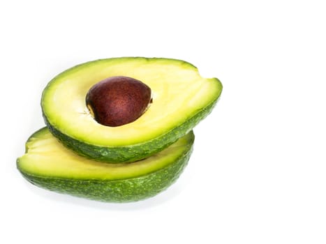 ripe avocado in a cut on a white background