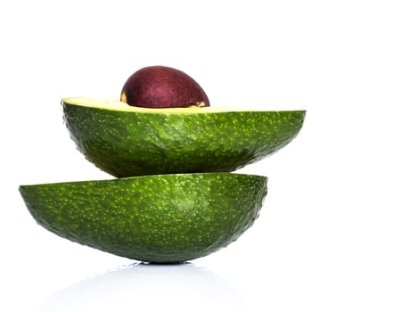 ripe avocado in a cut on a white background