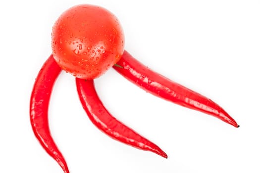 tomatoes and hot peppers on a white background