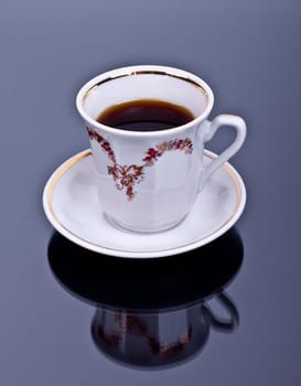 cup of coffee on a black background