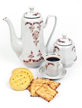 coffee service and coffee with biscuits on a light background
