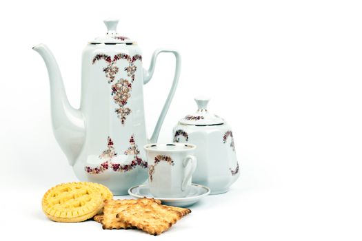 coffee service and coffee with biscuits on a light background