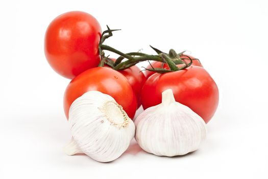 tomatoes and garlic on a light background