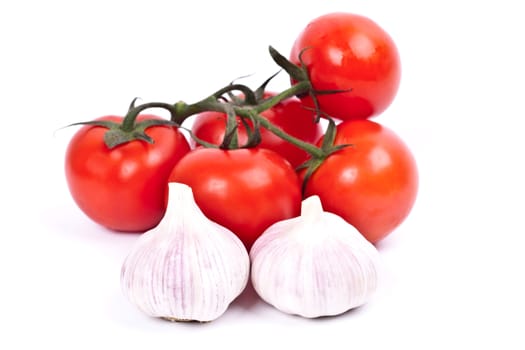 tomatoes and garlic on a light background