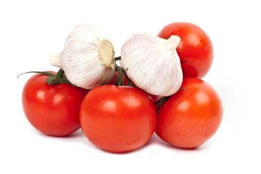 tomatoes and garlic on a light background