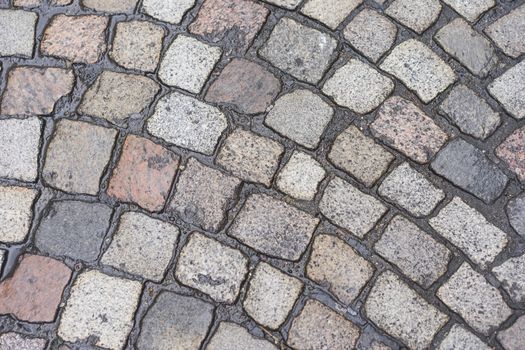 Old wet pavement with Cobblestone texture Background