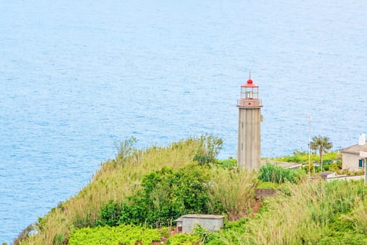 Sao Jorge, Madeira - June 7, 2013: Lighthouse Ponta de Sao Jorge - a famous tourist sight at the north coast of Madeira.