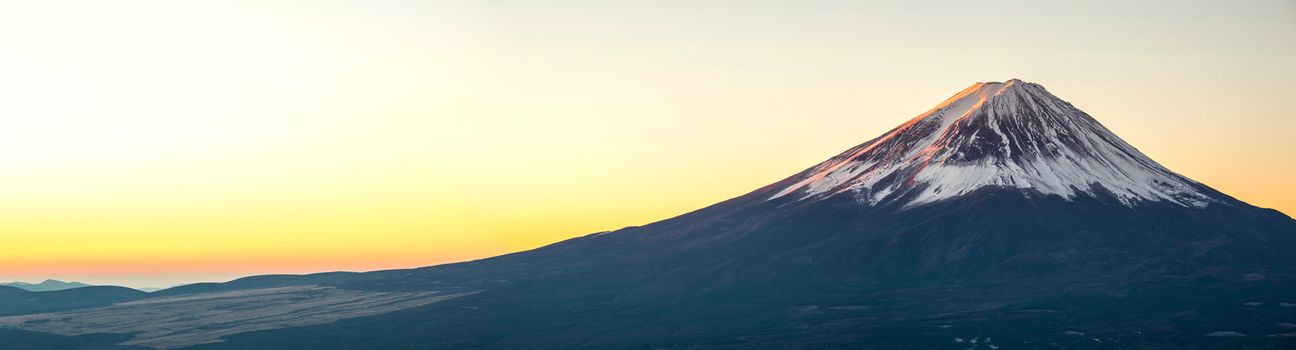 Mountain Fuji in winter sunrise panorama