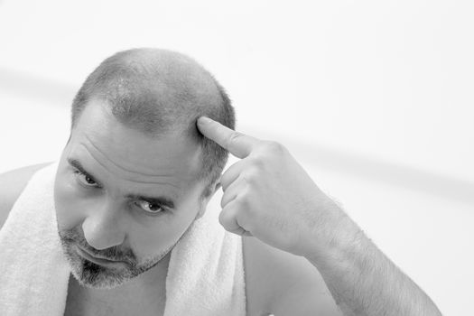 40s man with an incipient baldness , close-up, white background
