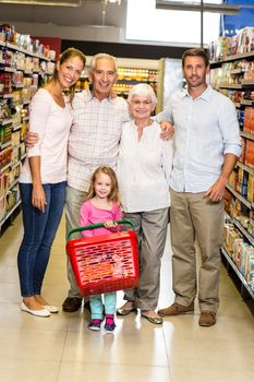 Portrait of smiling extended family at the supermarket