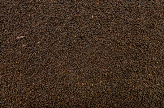 dry black tea leaf texture pattern background