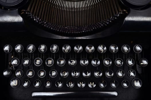 Vintage old black typewriter close detail of keyboard