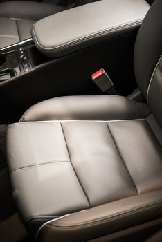 Comfortable Modern Compact Car Seats Vertical Photo. Long Distance Drive Comfort Concept.