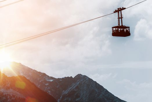 Mountains Gondola Lift at Sunset. European Alps Gondola Cable Car.