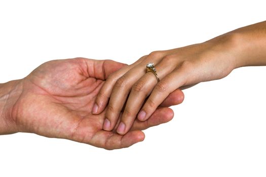 Close-up of couple holding hands against white background