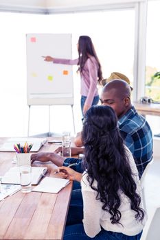 Business people at presentation in creative office