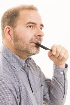 40s man with an incipient baldness, doing hair with a comb