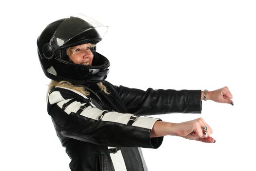 Woman motorcyclist in front of white background.