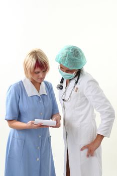Doctor and nurse discusing what to do